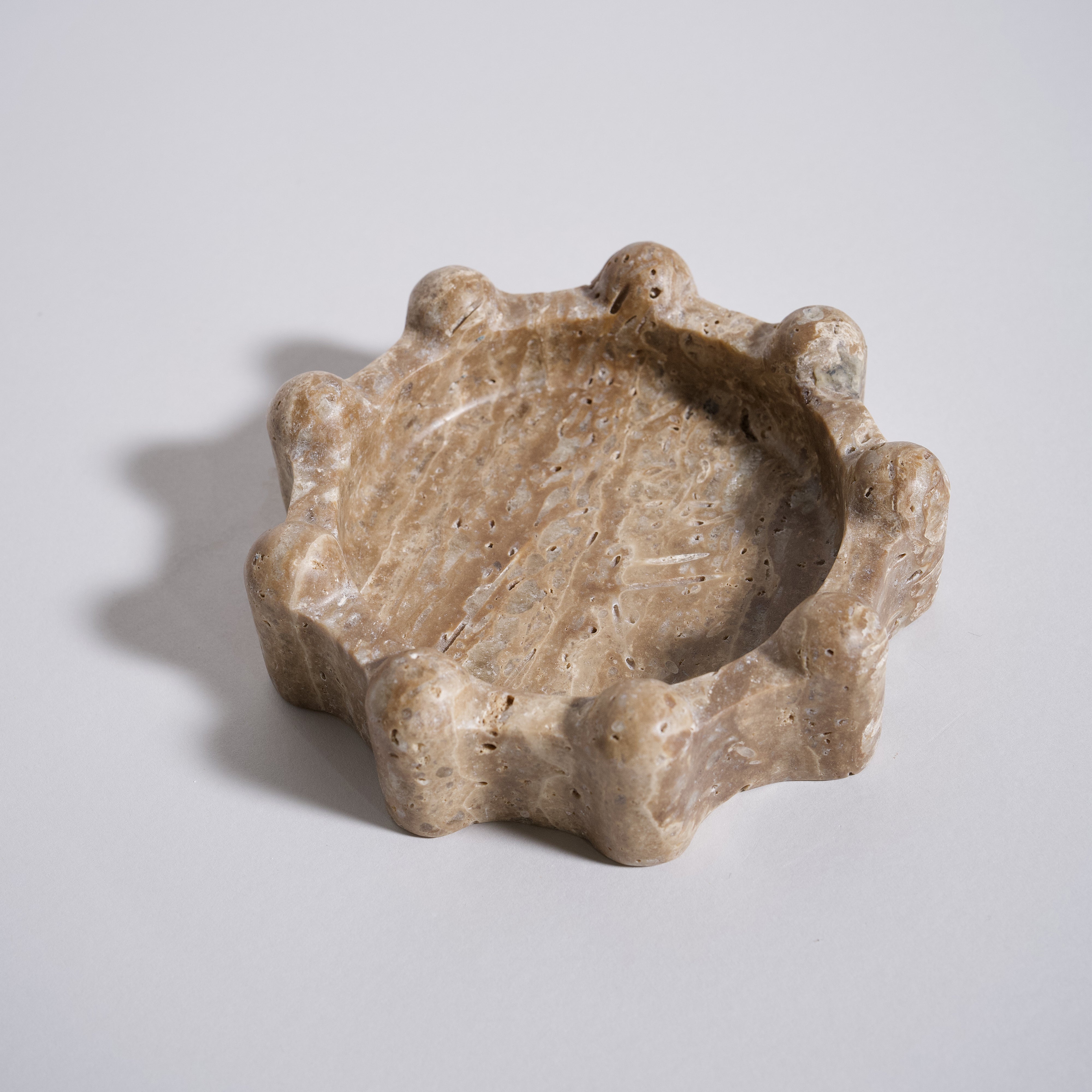 As Shown in Brown Travertine