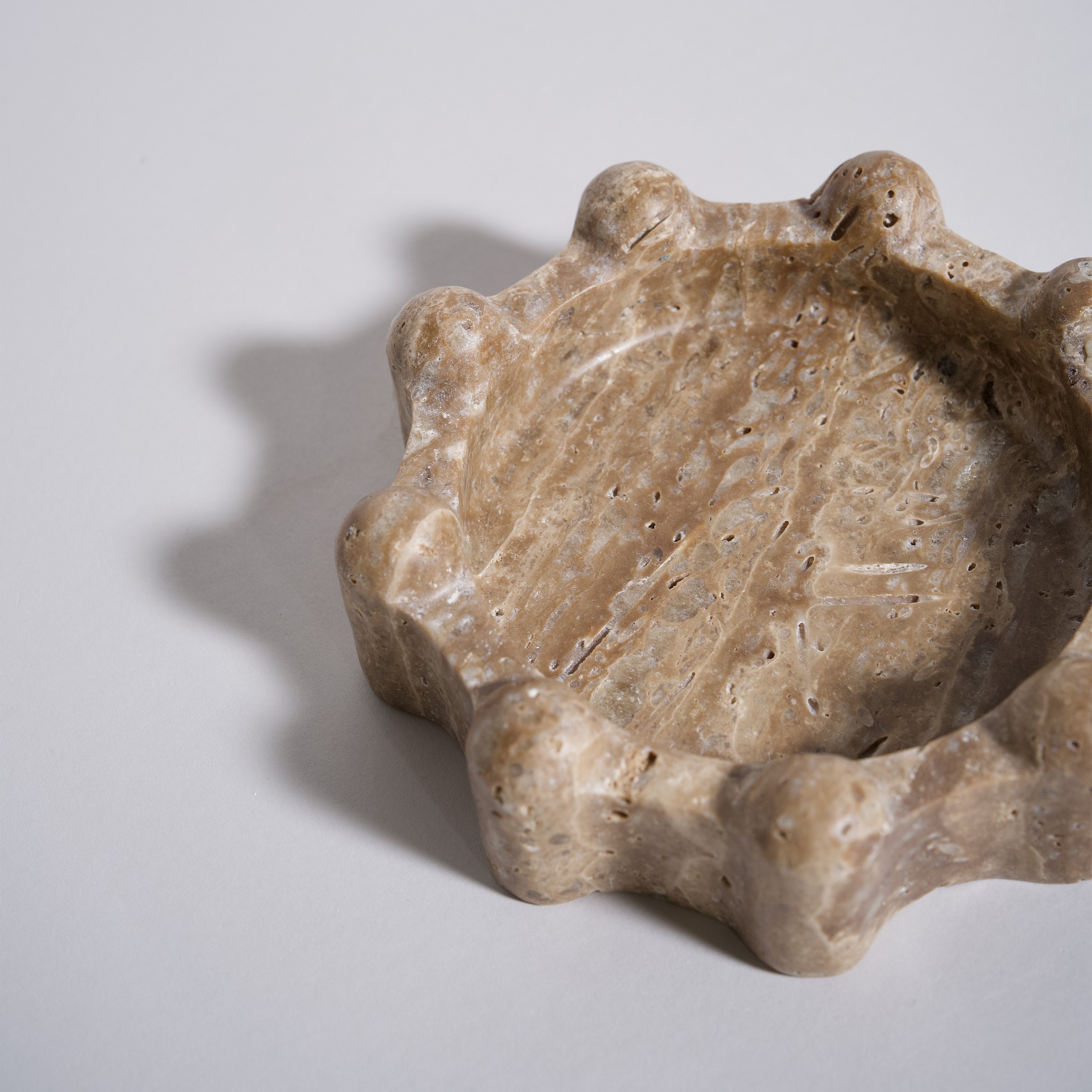 As Shown in Brown Travertine