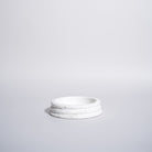 As Shown in White Travertine