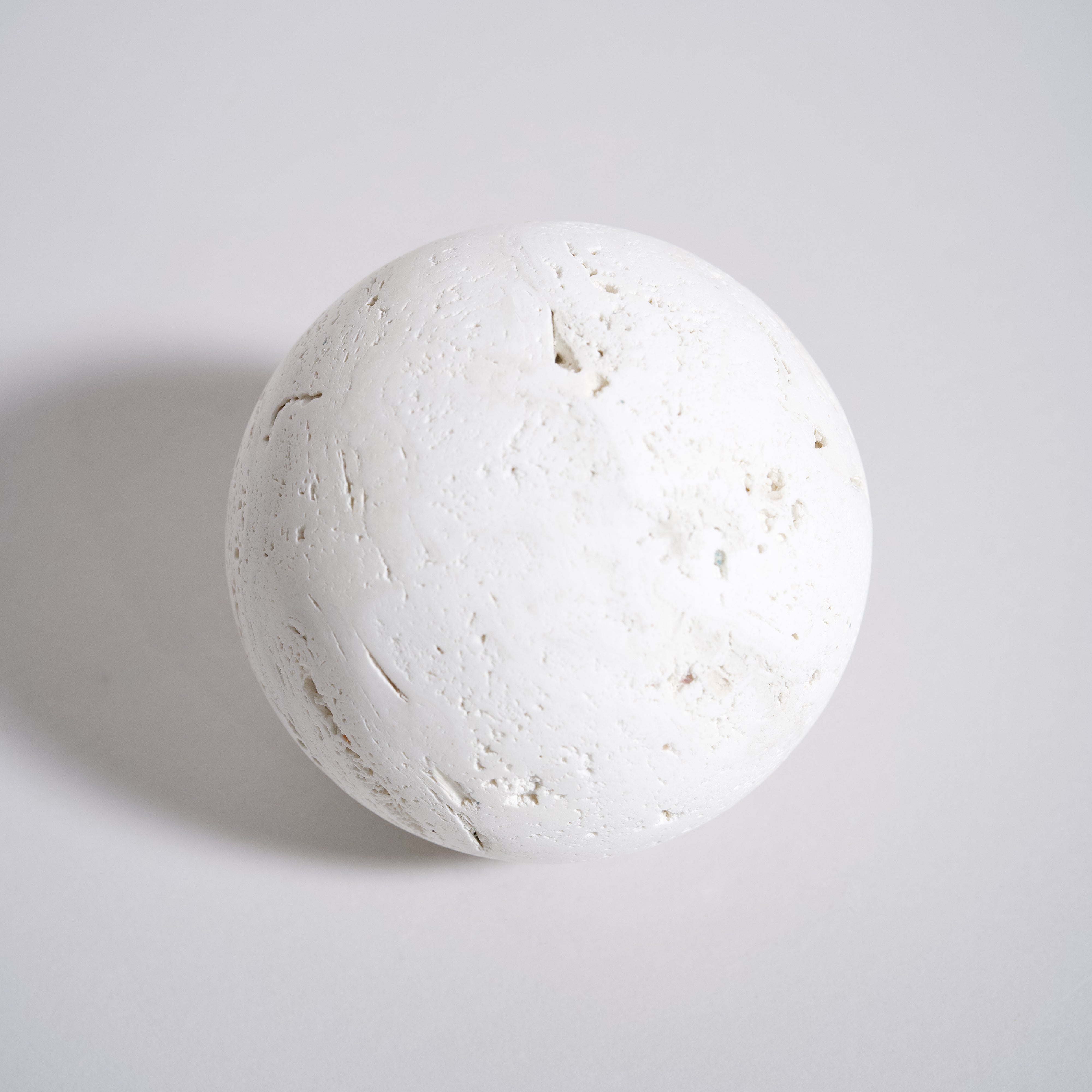 As Shown in White Travertine