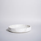 As Shown in White Travertine