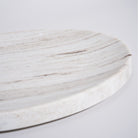 As shown in White Wooden Marble
