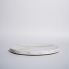 As shown in White Wooden Marble
