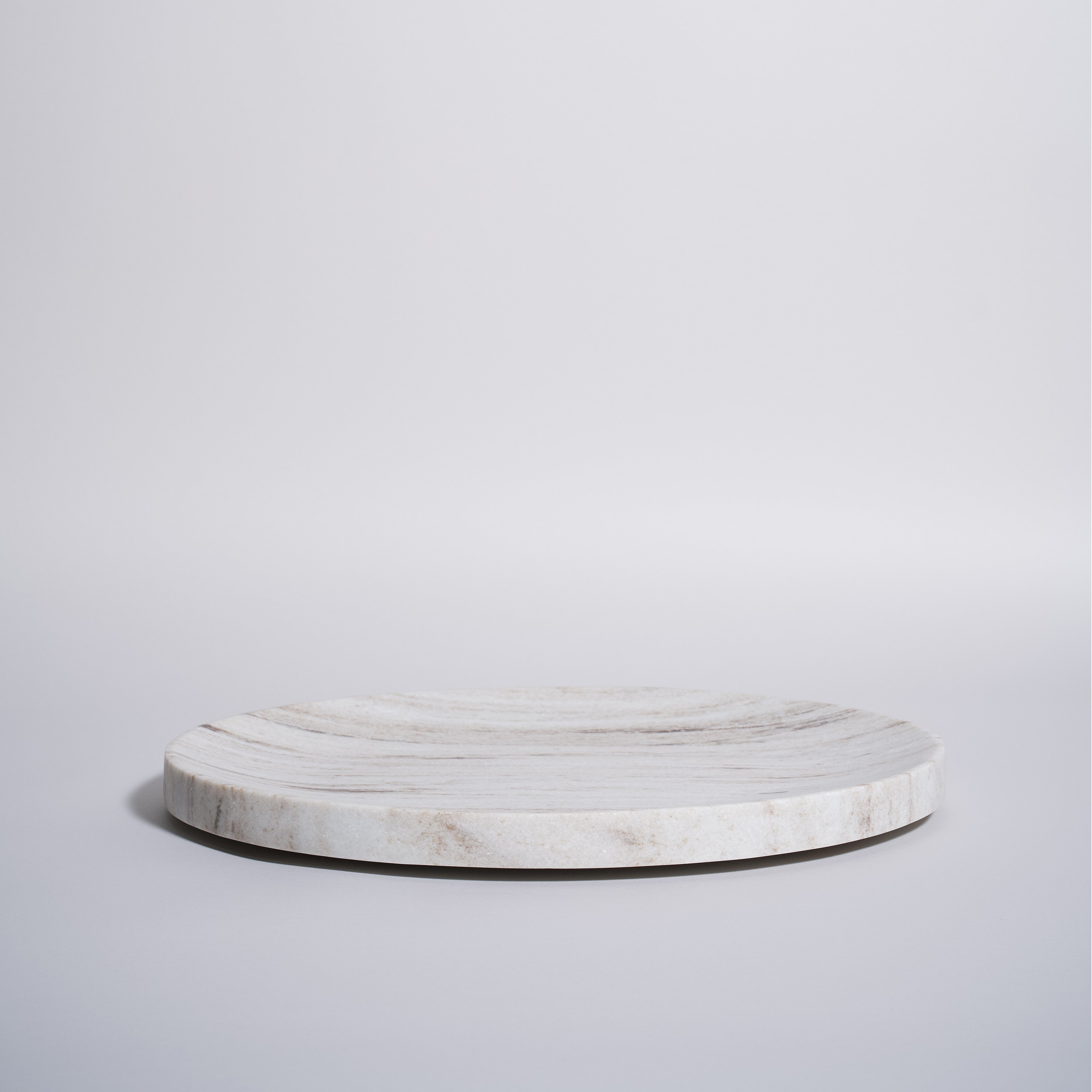 As shown in White Wooden Marble