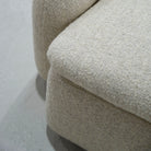 As Shown: in Berber Natural, swivel finished in Mint White Natural.