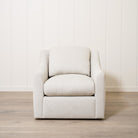 As Shown: Upholstered in Marion Natural, swivel.