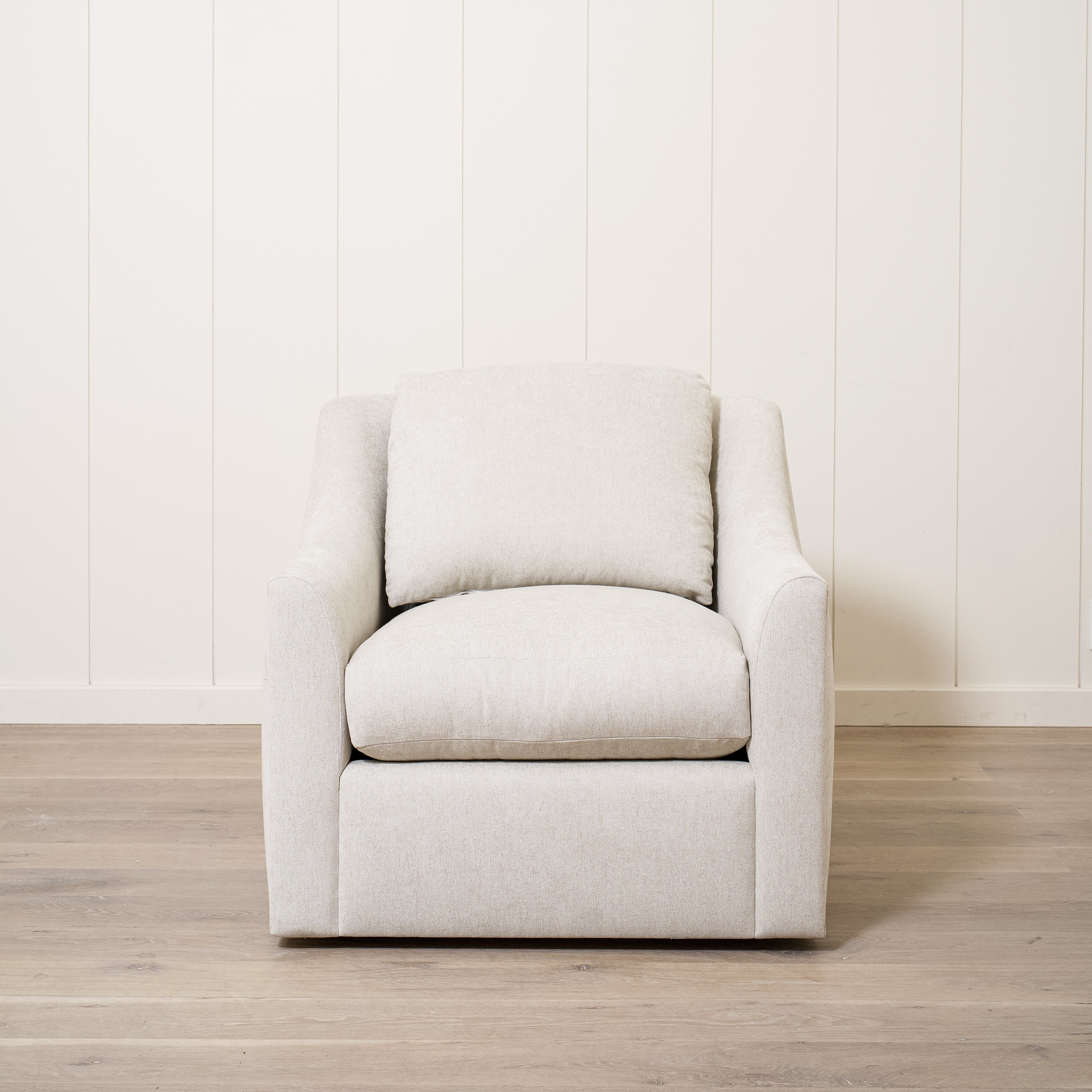 As Shown: Upholstered in Marion Natural, swivel.