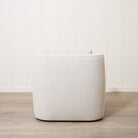As Shown: Upholstered in Marion Natural, swivel.