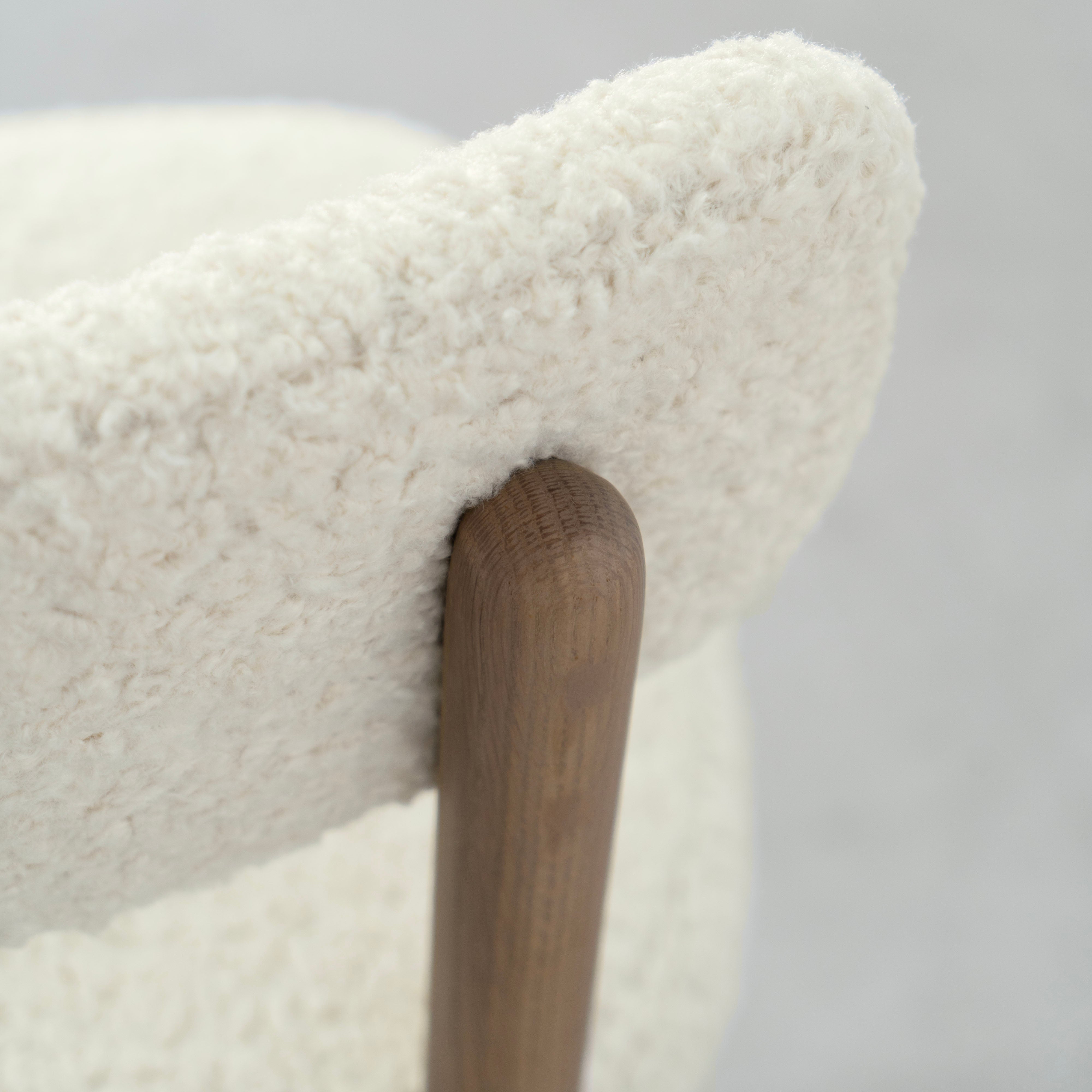 As Shown: in Sheepskin Ivory. Oak finished in Cashmere Brown (Discontinued Finish).