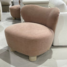 As Shown in Granby Clay, legs finished in Sand.
