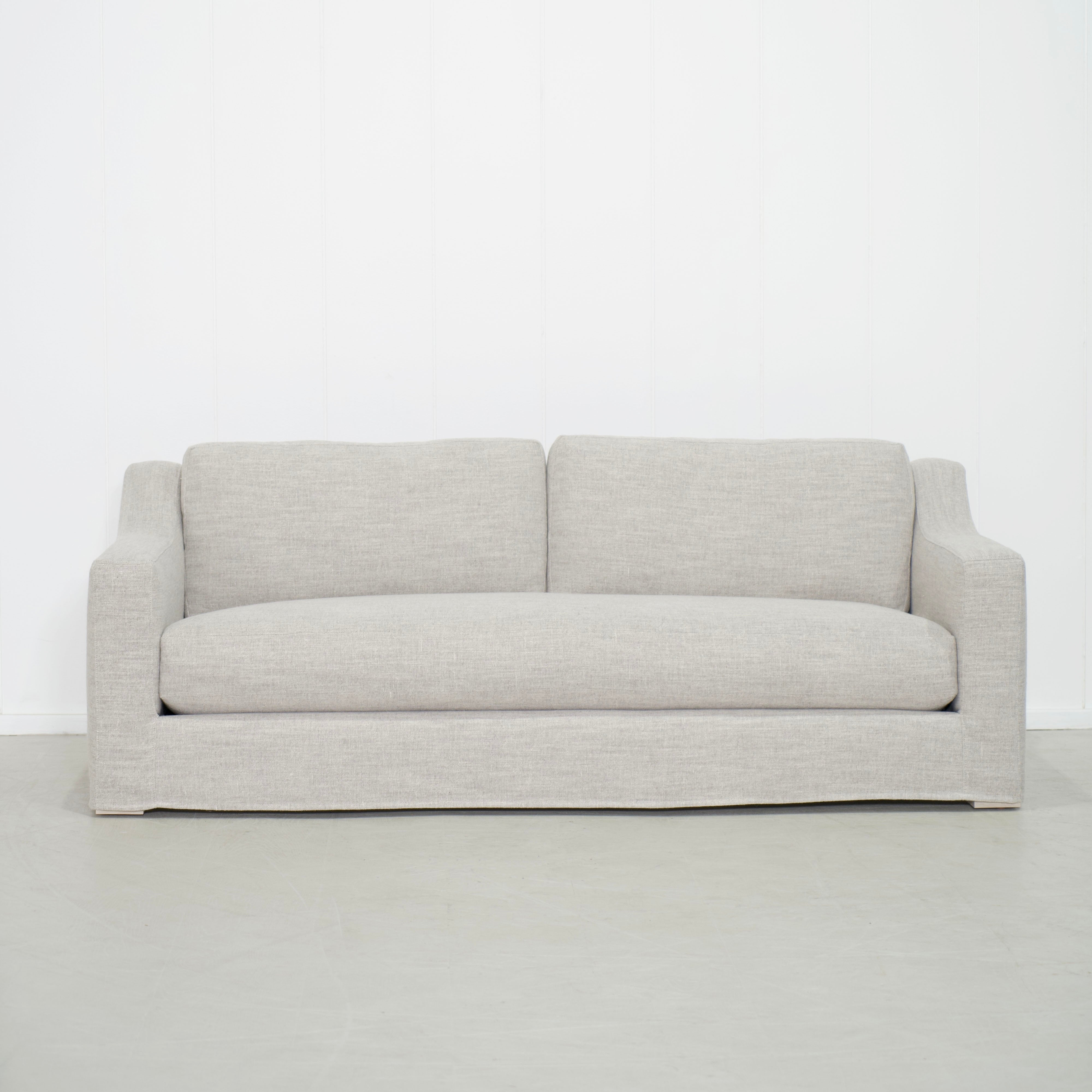 As Shown: Slipcovered in Belgian Mulberry with a 2 over 1 Cushion Configuration
