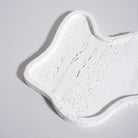 As shown in White Travertine