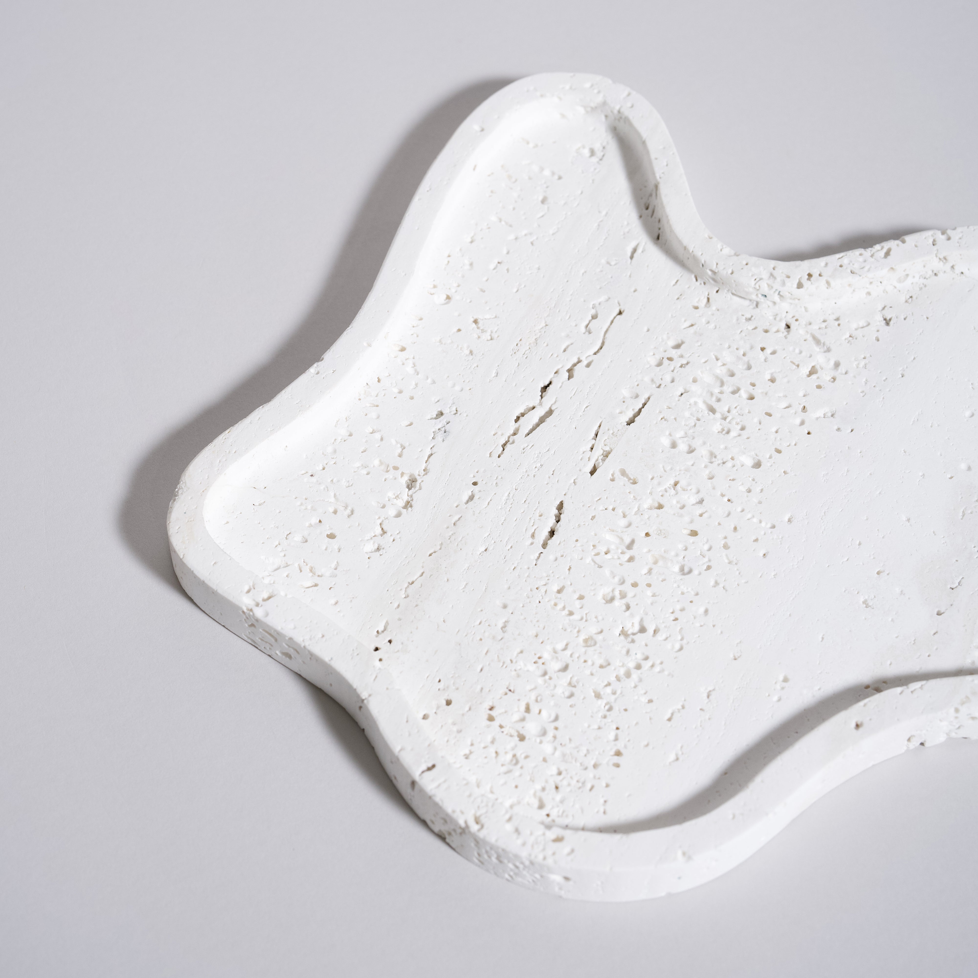 As shown in White Travertine