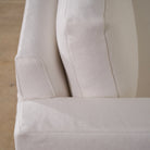 As Shown: slipcovered in COM fabric (Monte White), oak legs finished in Mint White Natural.