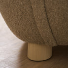 As Shown in Berber Shale, legs finished in Sand.