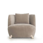 As Shown: in Sky Taupe with oak legs stained in Sand.