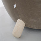 As Shown: in Sky Taupe with oak legs stained in Sand.
