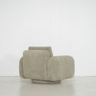 As Shown: in Bellamy Moss, upholstered base, swivel.