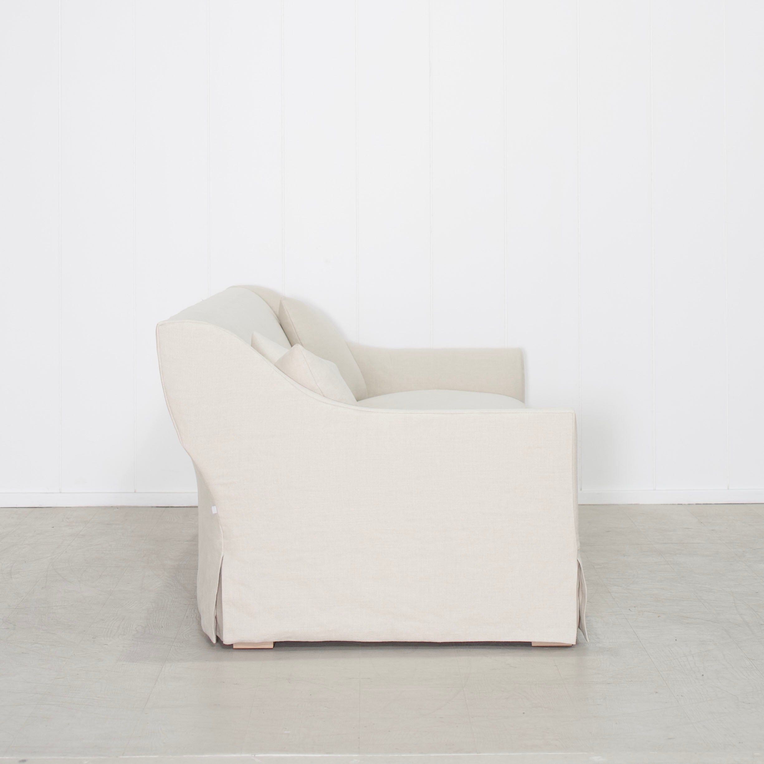 As Shown: Slipcovered in Fresno Sand with a 2 over 1 Cushion Configuration