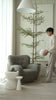 As shown upholstered in Berber Shale, legs in Sand finish