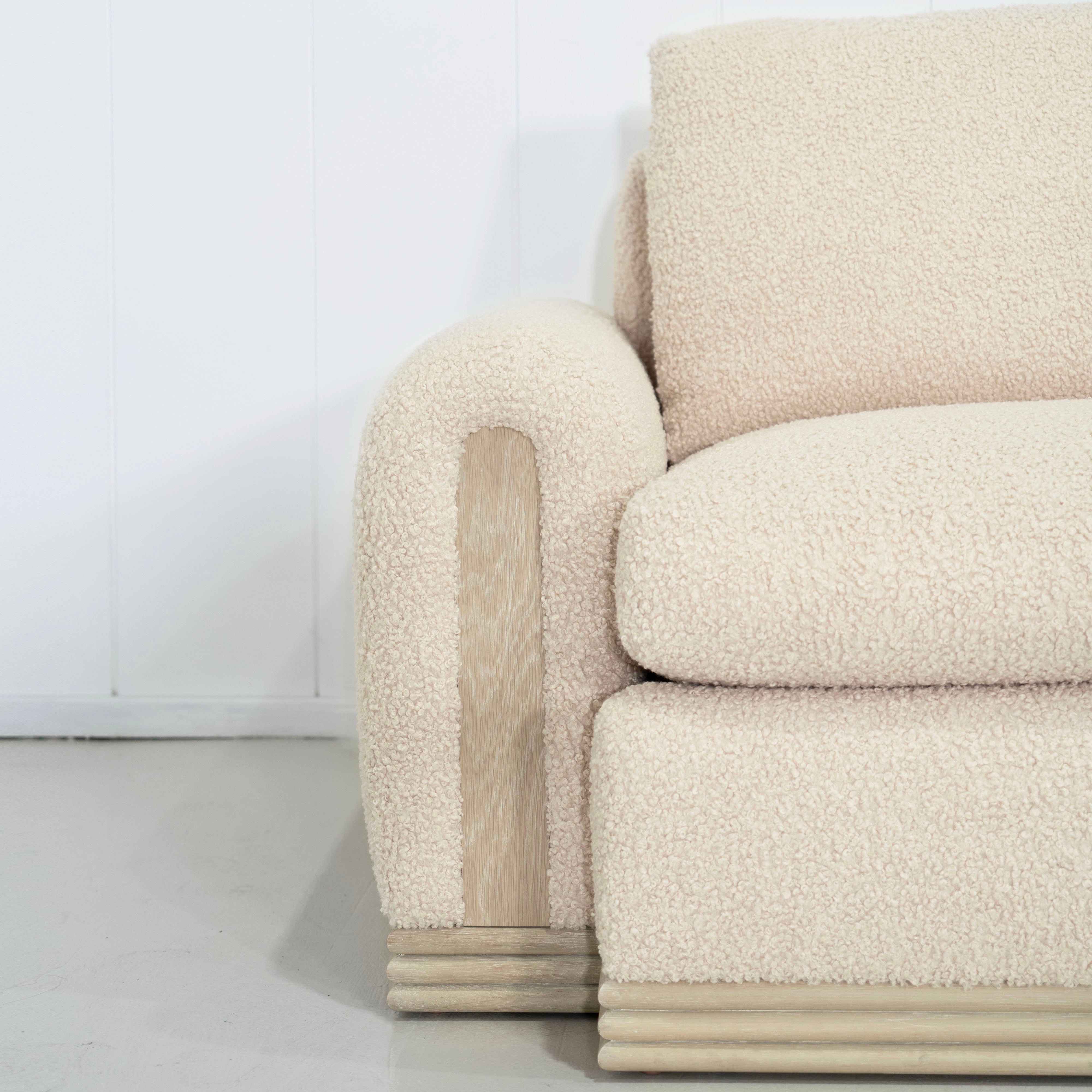 As Shown: Upholstered in Teddy Ivory, oak base finished in Mint White Natural