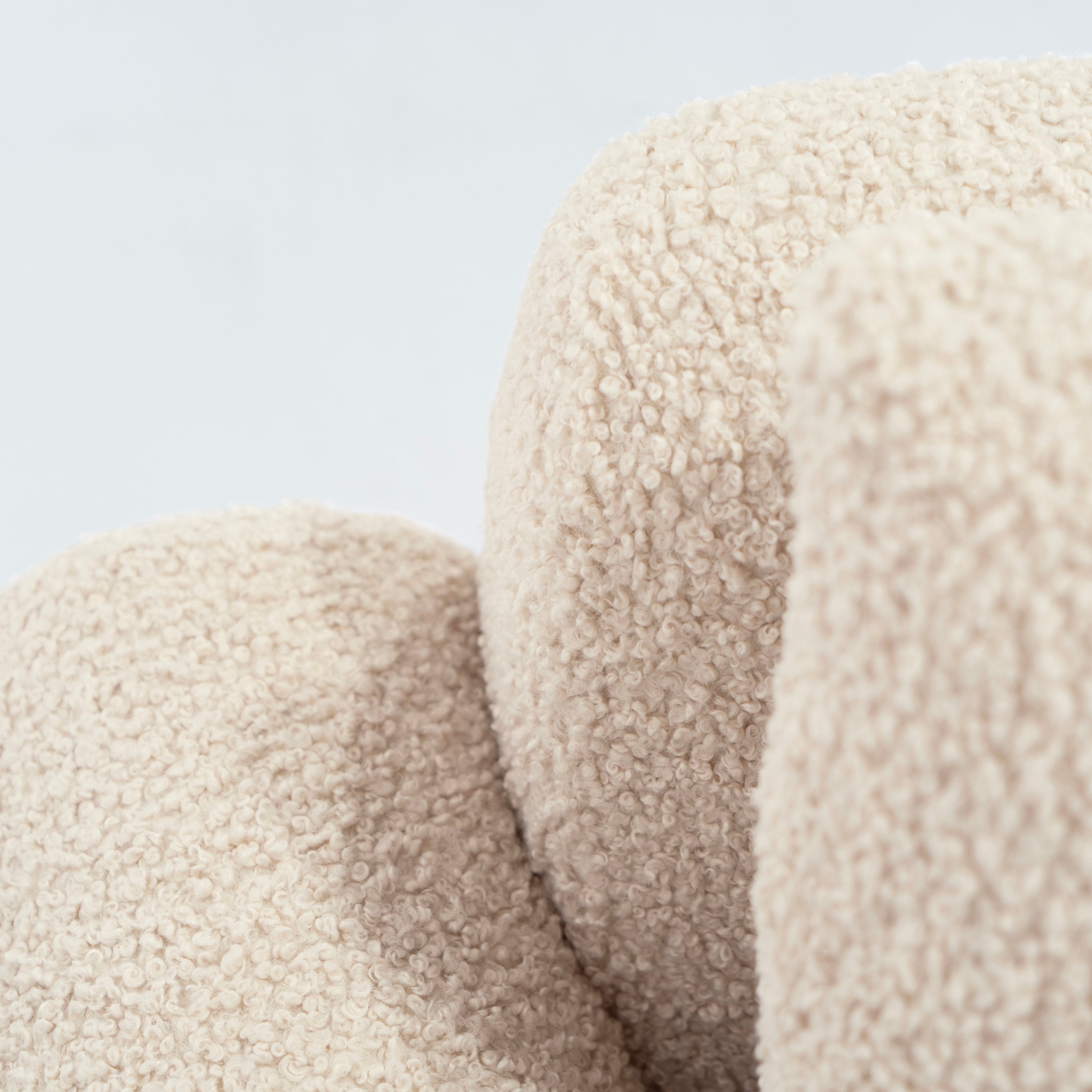 As Shown: Upholstered in Teddy Ivory, oak base finished in Mint White Natural