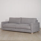 As Shown: in COM fabric, oak legs finished in Mint White Natural.