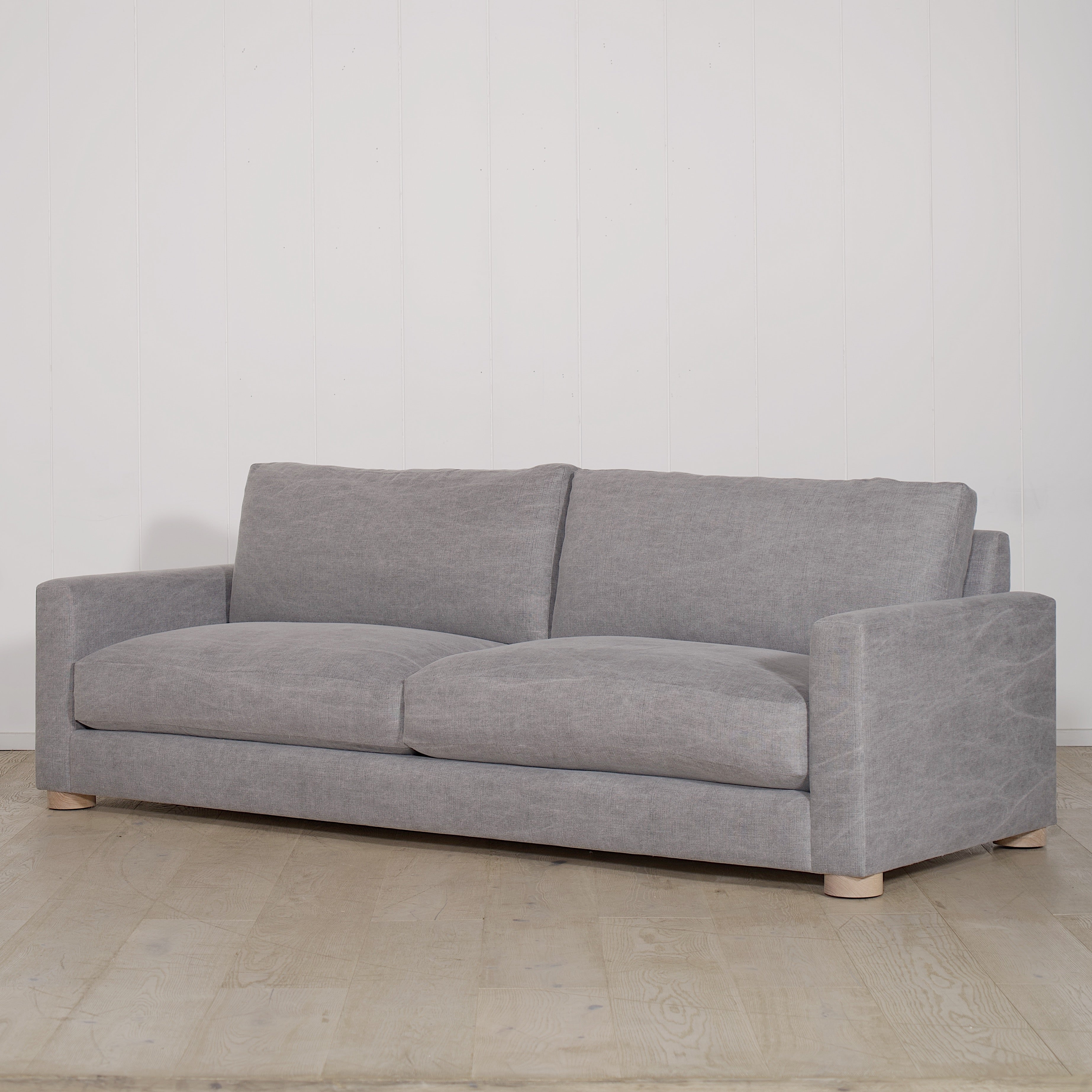 As Shown: in COM fabric, oak legs finished in Mint White Natural.