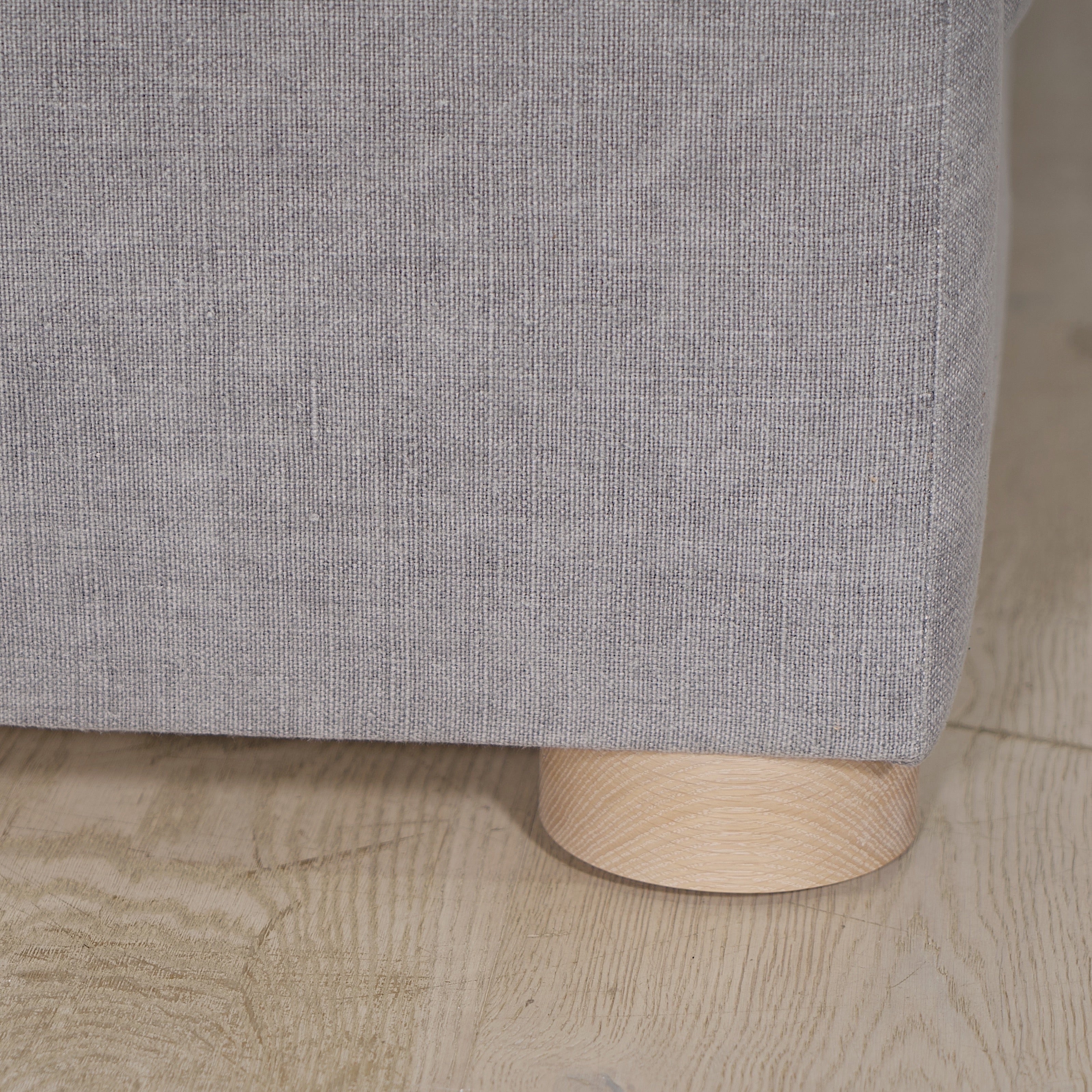 As Shown: in COM fabric, oak legs finished in Mint White Natural.