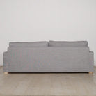 As Shown: in COM fabric, oak legs finished in Mint White Natural.