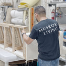 As Shown: Medium, Upholstered in Belgian Oatmeal with legs finished in Mint White Natural.