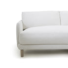 As Shown: in right chaise upholstered in Nomad Snow, oak legs finished in Antique Beige (Discontinued Finish)