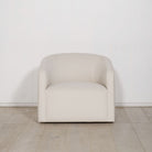 As Shown: in upholstered Parker Sand, swivel.