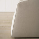 As Shown: in upholstered Parker Sand, swivel.