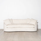 As Shown: in upholstered Zion Custard, oak legs finished in Mint White Natural.