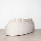 As Shown: in upholstered Zion Custard, oak legs finished in Mint White Natural.