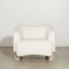 As Shown: in Berber White. Oak legs finished in Mint White Super White
