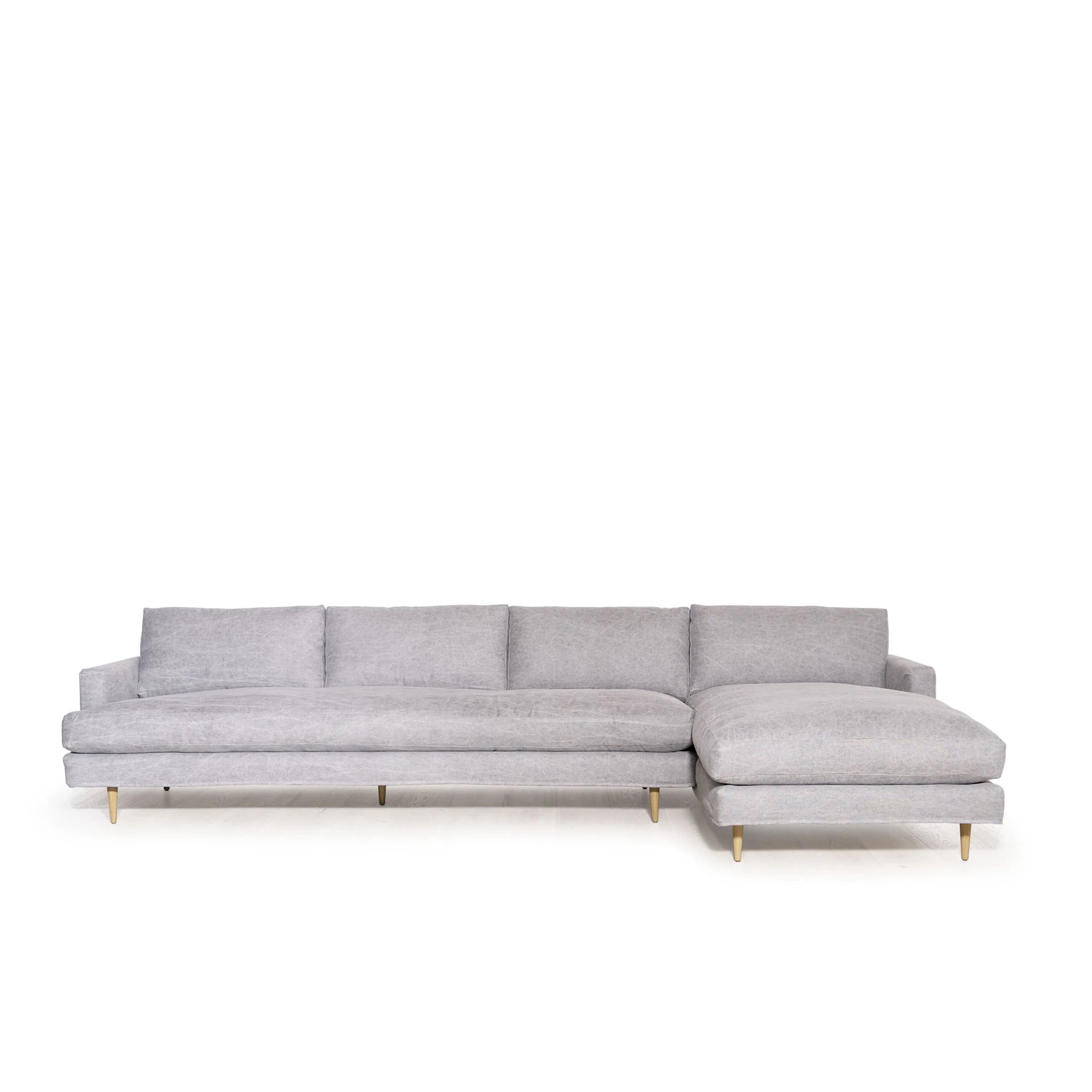 As Shown: Slipcovered in COM. Oak legs finished in Mint White Natural.