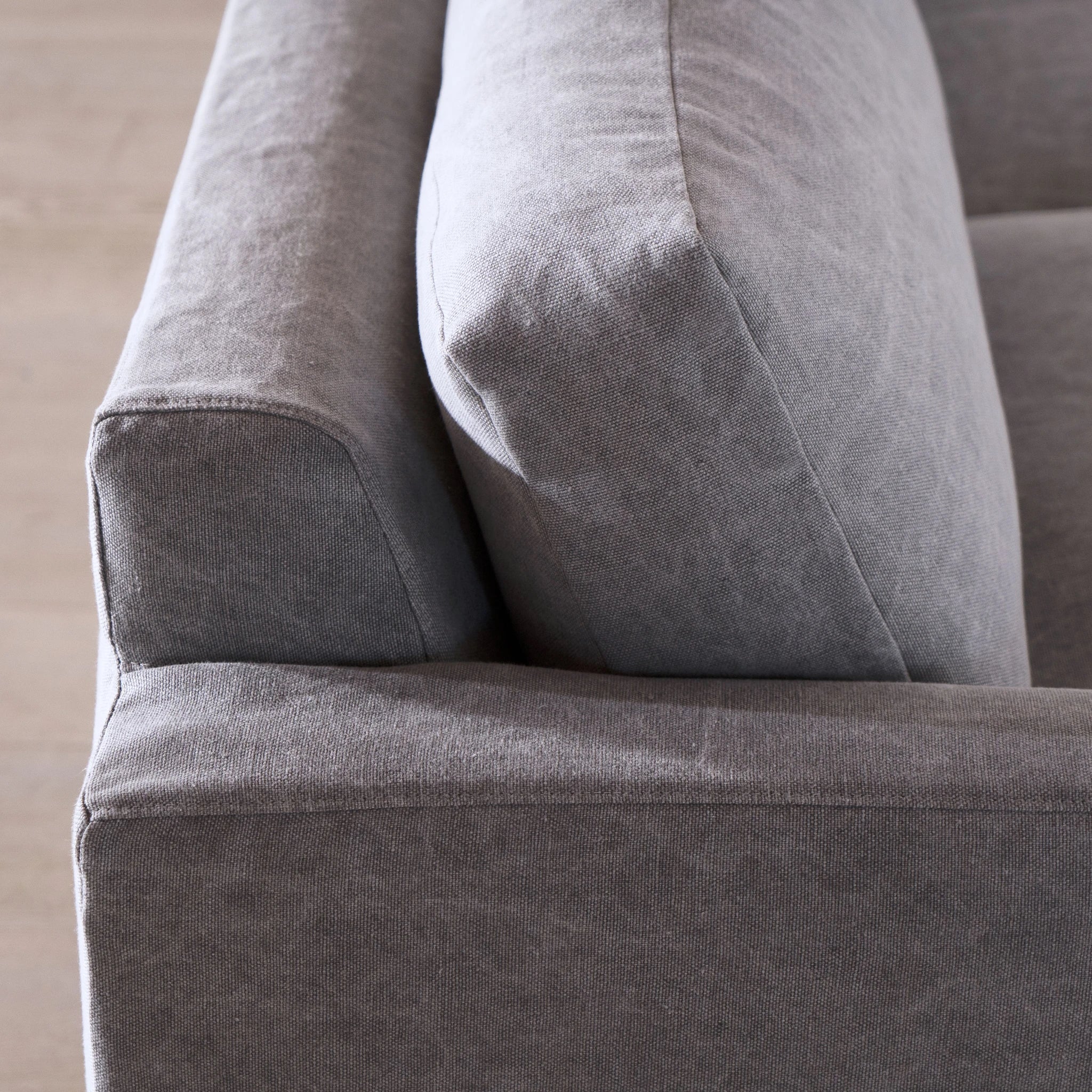 As Shown: Slipcovered in COM. Oak legs finished in Mint White Natural.