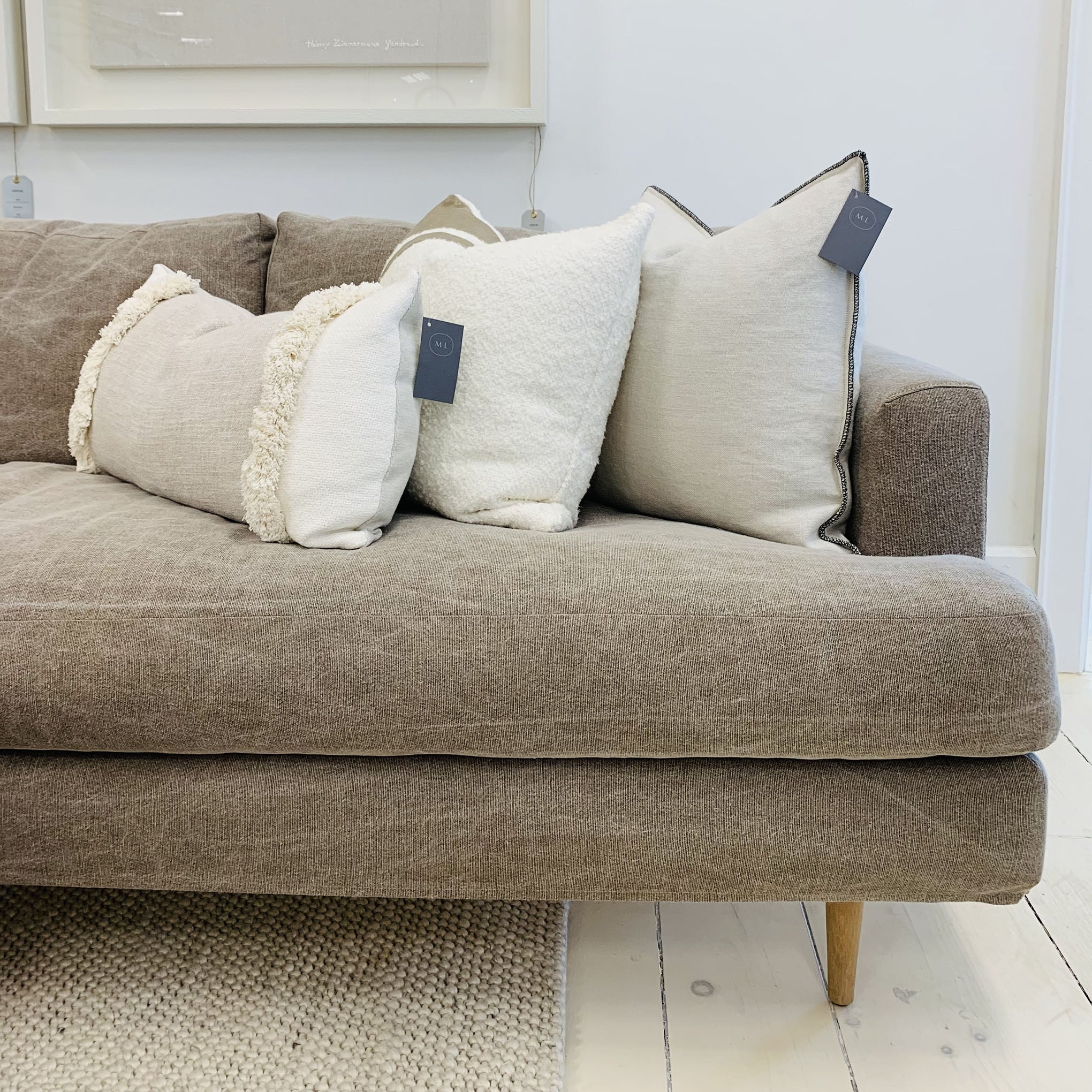 As Shown: Slipcovered in COM. Oak legs finished in Mint White Natural.