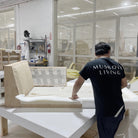 As Shown: Slipcovered in COM. Oak legs finished in Mint White Natural.