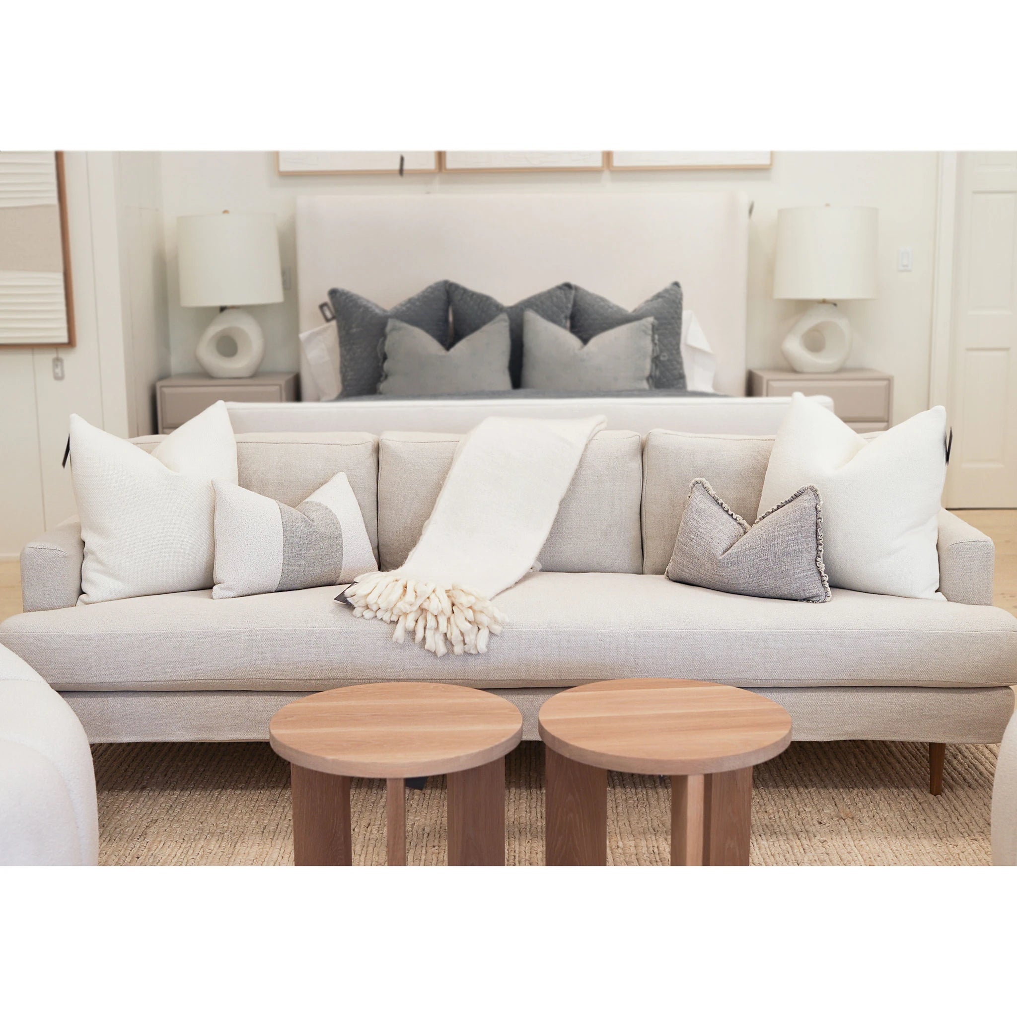 As Shown: Medium, Upholstered in Belgian Oatmeal with legs finished in Mint White Natural.
