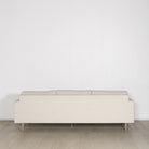 As Shown: Medium, Upholstered in Belgian Oatmeal with legs finished in Mint White Natural.