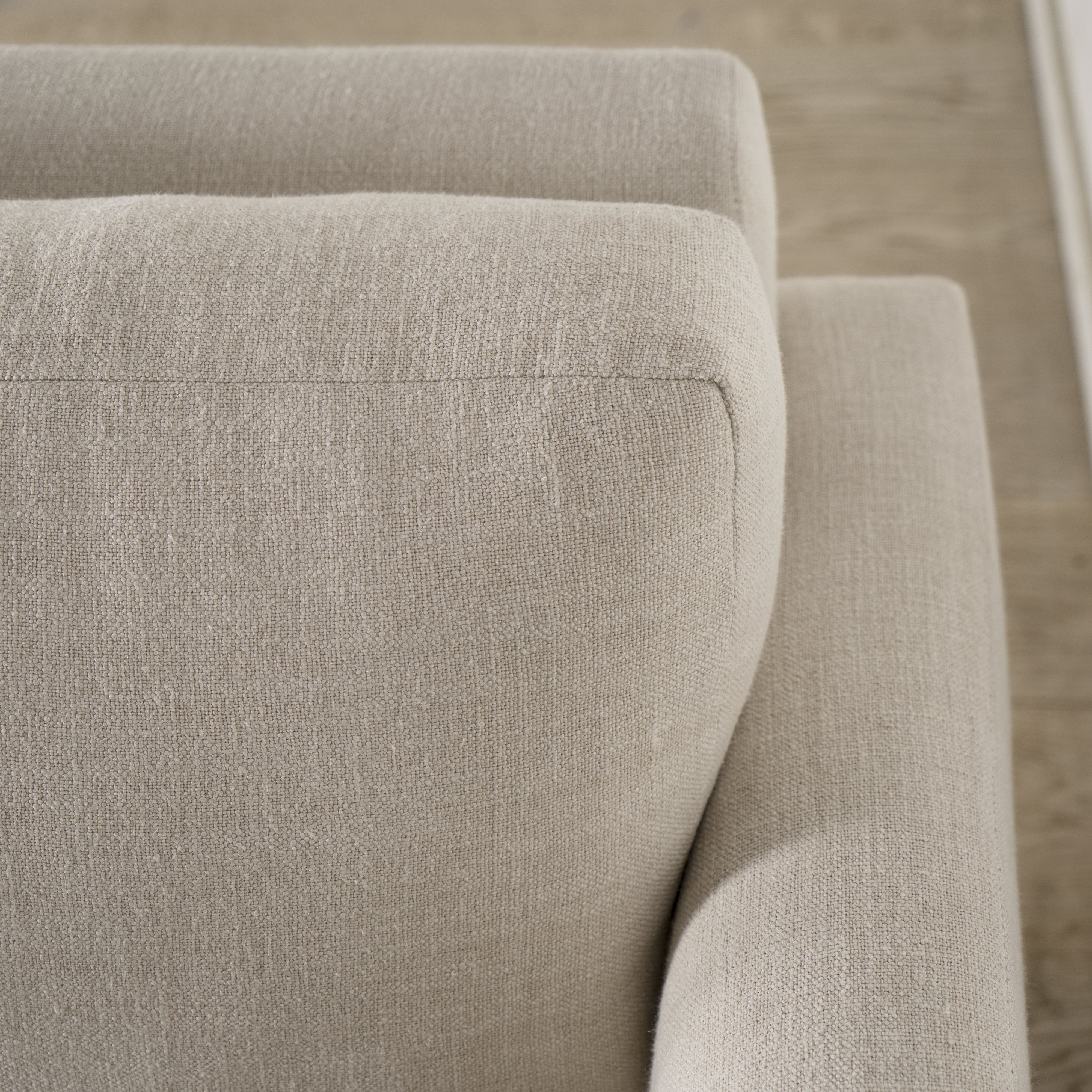 As Shown: Medium, Upholstered in Belgian Oatmeal with legs finished in Mint White Natural.