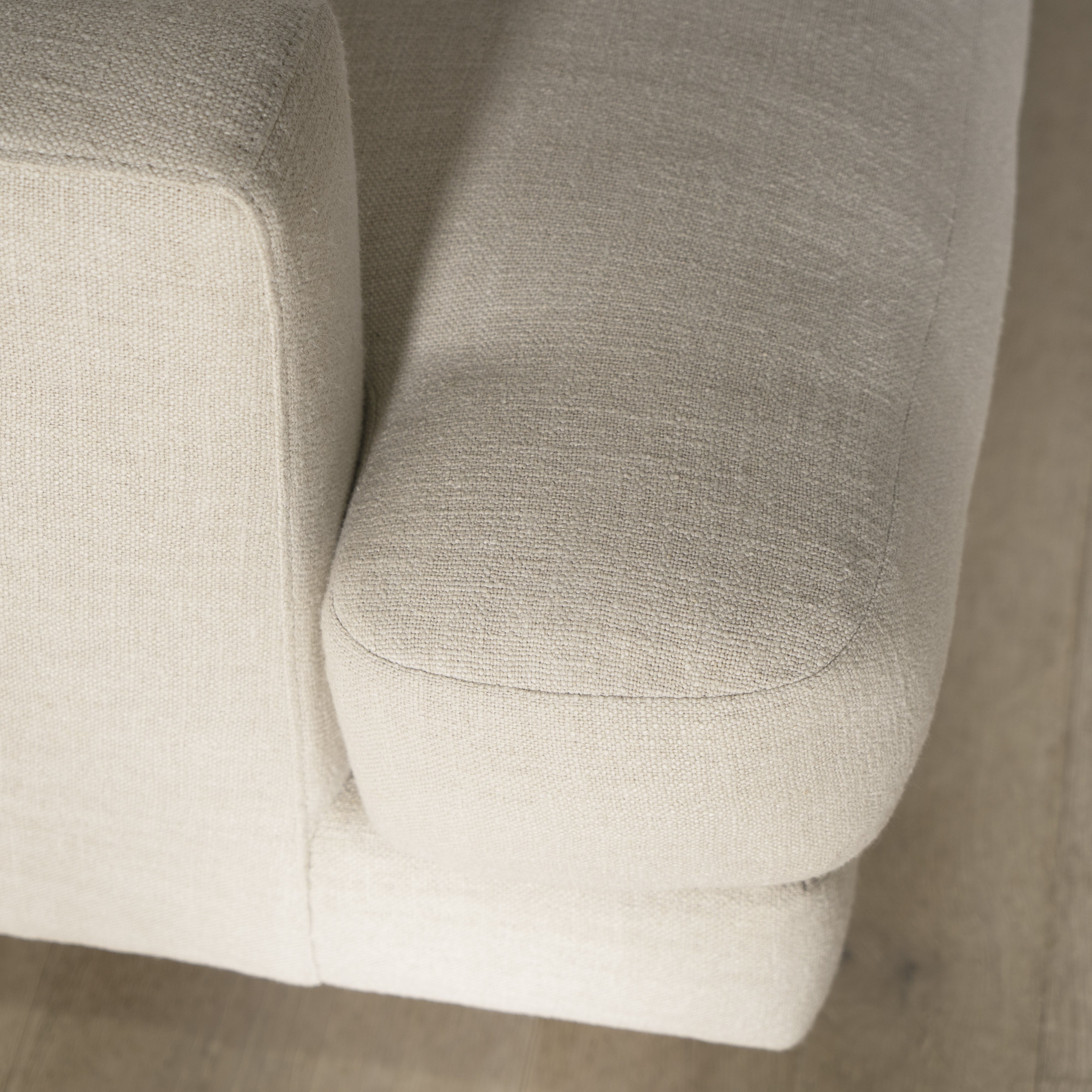 As Shown: Medium, Upholstered in Belgian Oatmeal with legs finished in Mint White Natural.