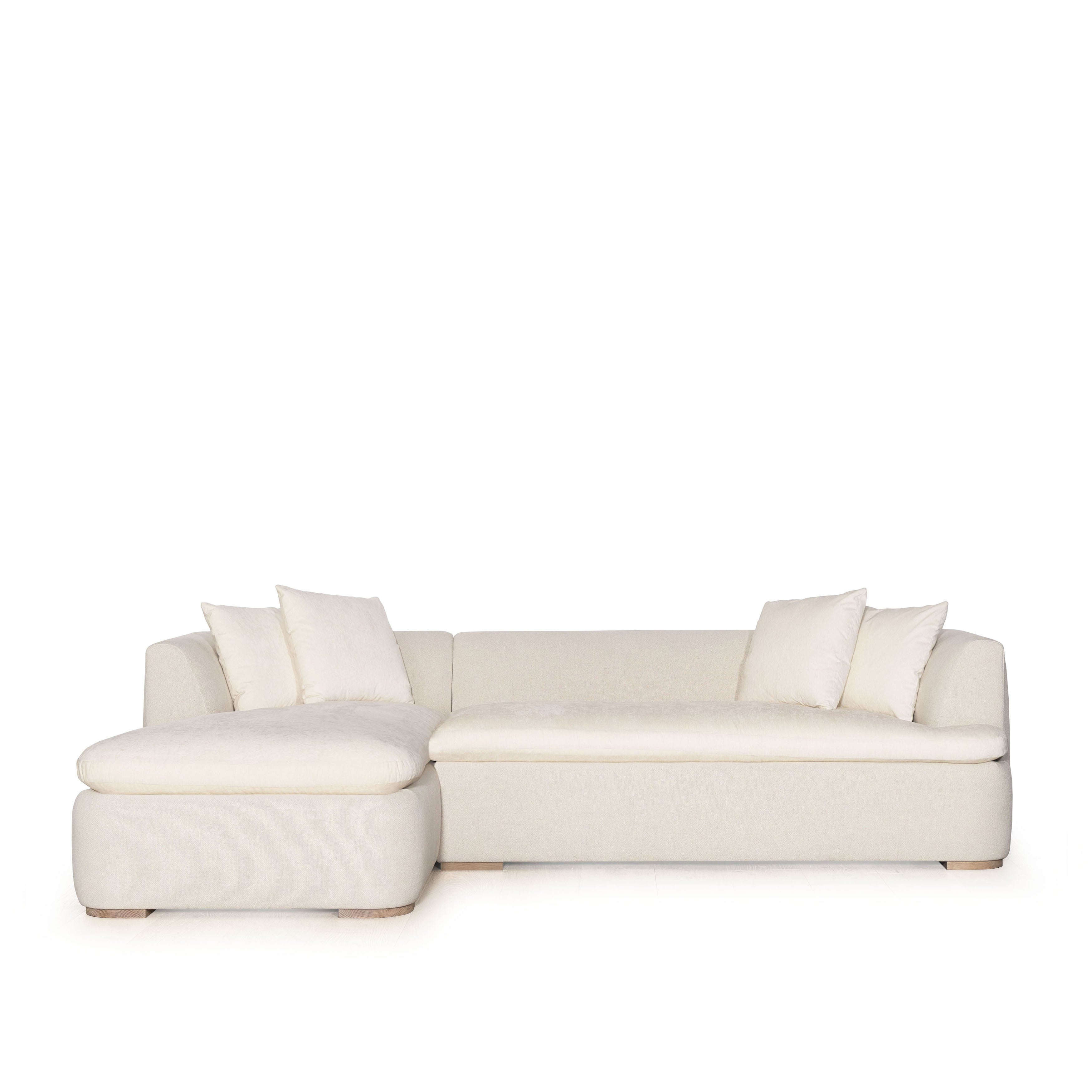 As Shown: Upholstered in COM with Lincoln Parchment seat cushions and pillows. Last variant  in Belgian Sky Blue.Oak legs finished in Mint White Natural.