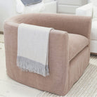 As Shown: in swivel, slipcovered Granby Clay