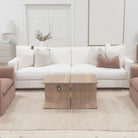 As Shown: in Large, short slipcovered in Fresno Sand, oak legs in custom finish
