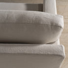 As Shown: in Large, short slipcovered in Fresno Sand, oak legs in custom finish