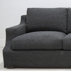 As Shown: in slipcovered Nomad Snow. And slipcovered Sheepskin Charcoal.